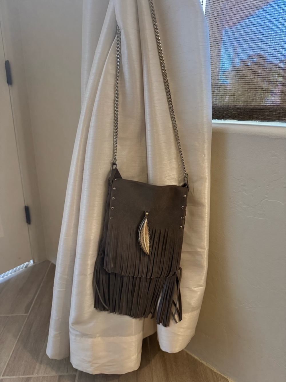 Fringed Gray Crossbody Bag with Feather Charm